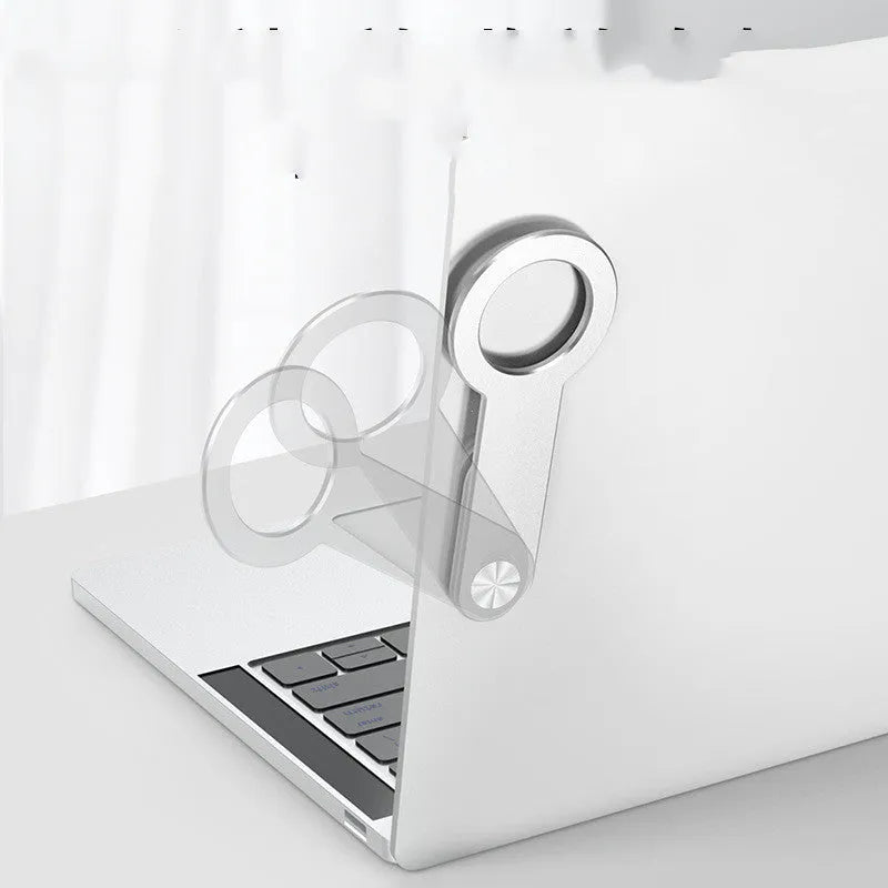 Metallic silver aluminium alloy desktop phone holder with magnetic extension for iPhone.