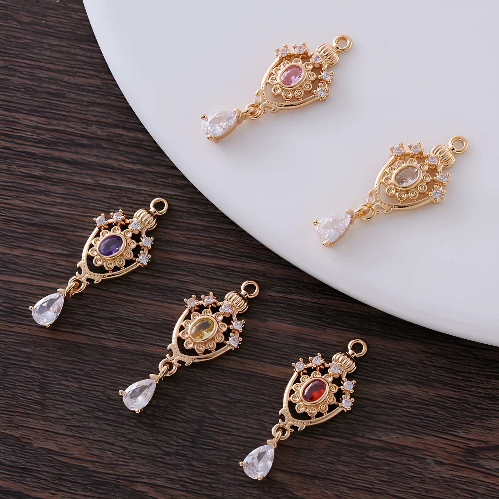 Small water drop-shaped pendant with a zircon crown charm in five colour choices