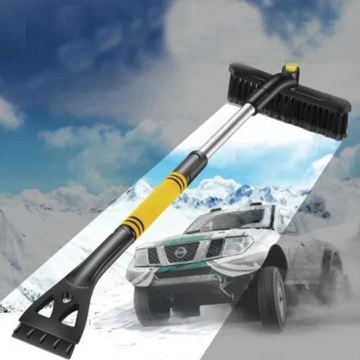 Yellow car telescopic snow shovel with aluminium handle, PVC brush and PP plastic scraper extended to 80cm on snowy windscreen