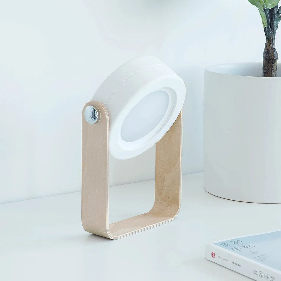 White foldable USB rechargeable LED lamp showing table lamp and lantern modes with touch dimmer.