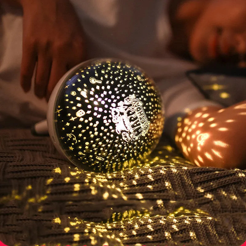 Rotating starlight projection night light with cartoon design in black or white colour options