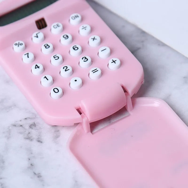 Creative cookie-shaped cute mini calculator with key ring in pink, blue, grey, and black colours