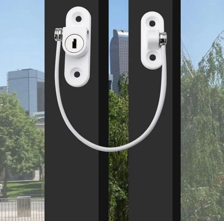 White window security chain lock with 18cm steel cable and locking head on a window frame
