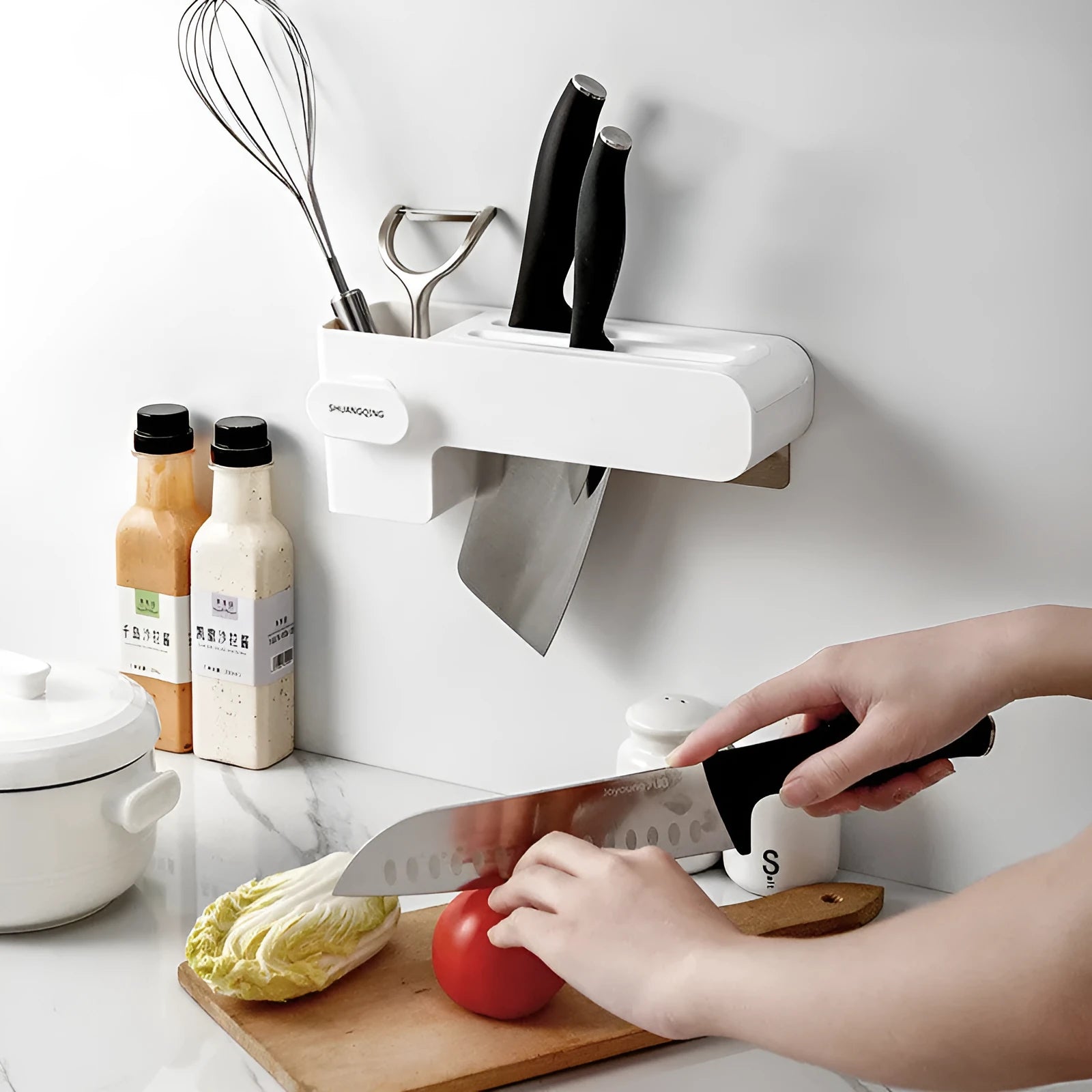 White plastic kitchen knife rack on countertop with dimensions 26 cm height