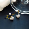 Korean style heart-shaped pearl stud earrings with alloy setting and inlaid gemstones