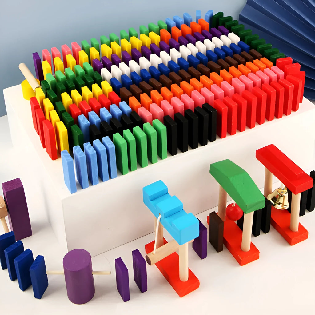 120-piece rainbow wooden domino blocks from pine wood with water-based paint on a flat surface