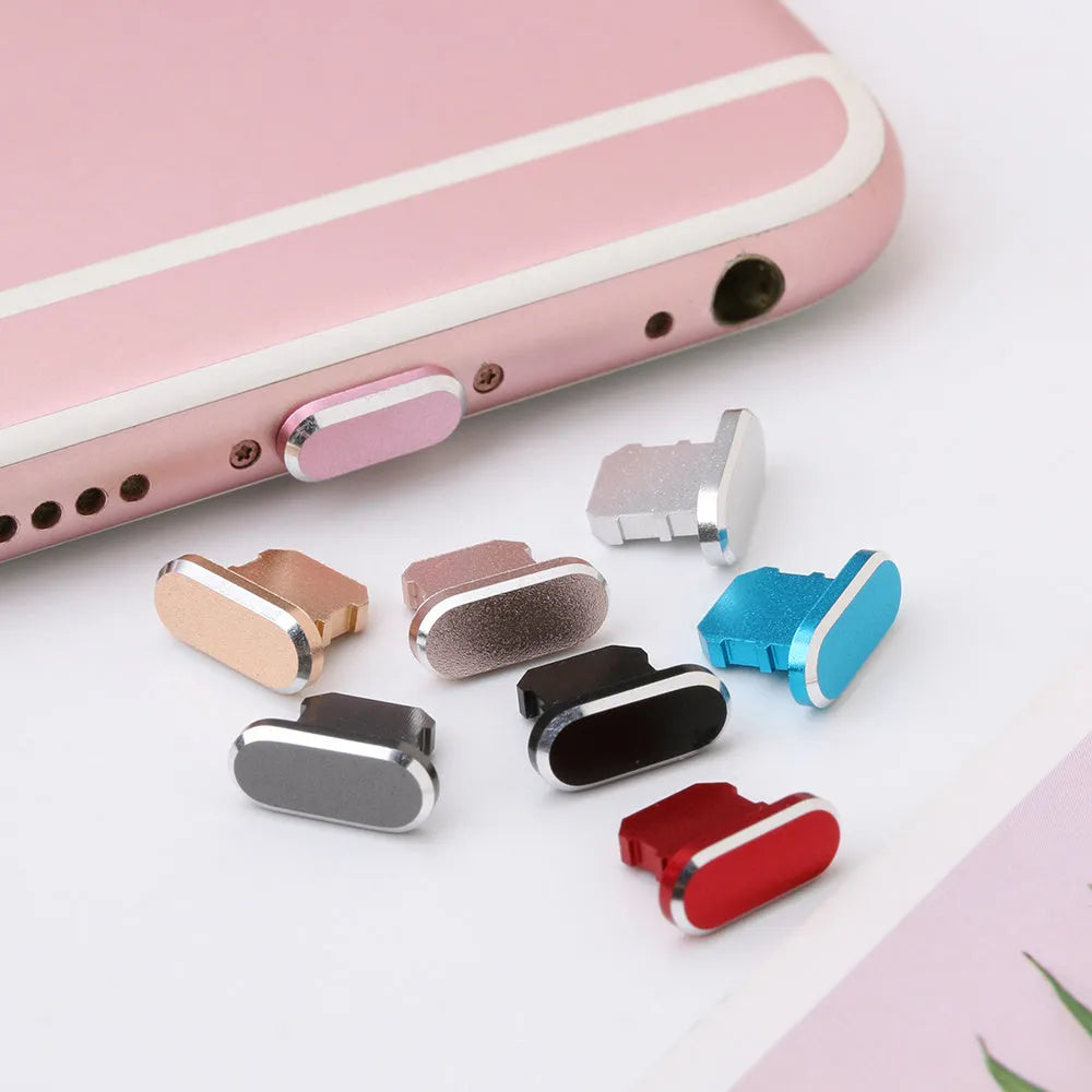 Aluminium alloy dust plug for iPhone charging port in various metallic colours.