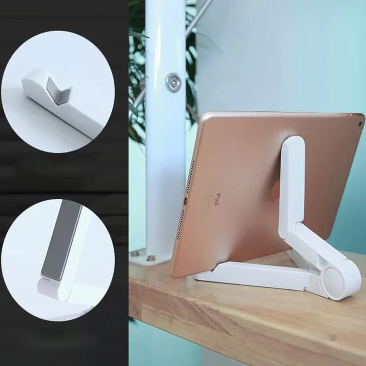 Black foldable tablet holder showing folded size next to tablet for scale