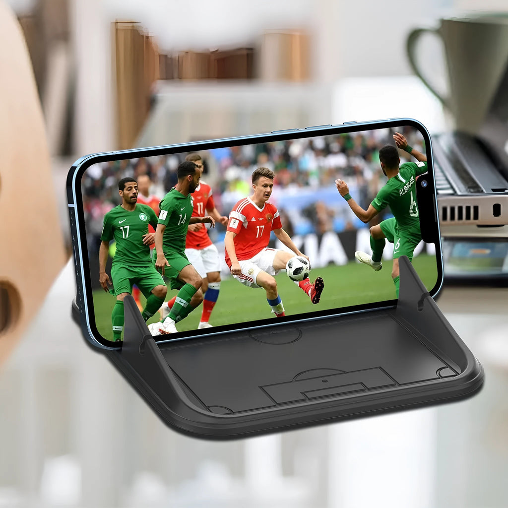 Peak-X5 silicone automobile phone holder with flexible construction for car and desktop mounting