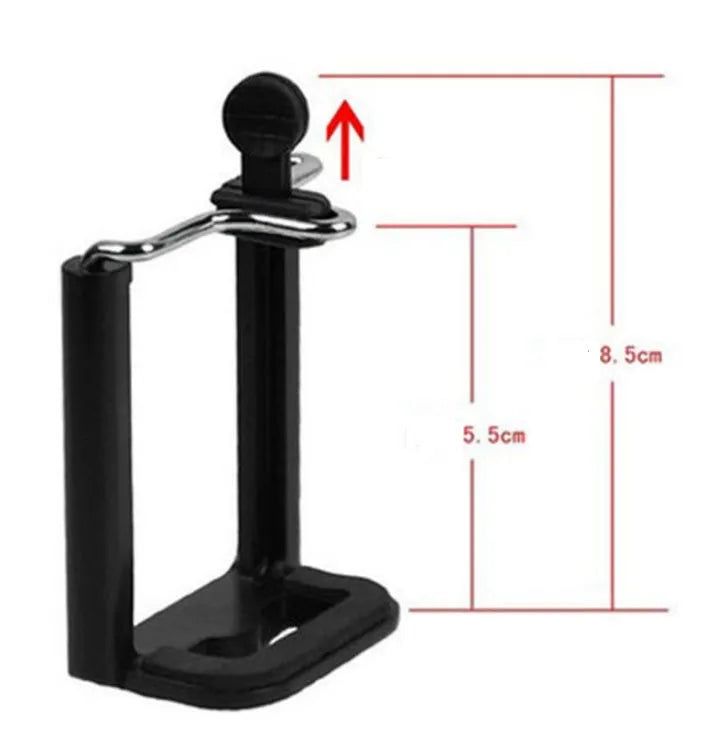 Compact mini desktop tripod with extendable aluminium legs and a black U-shaped phone clip attached.