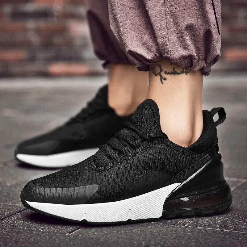 Men's breathable flyknit woven lace-up casual running shoes in black with white sole
