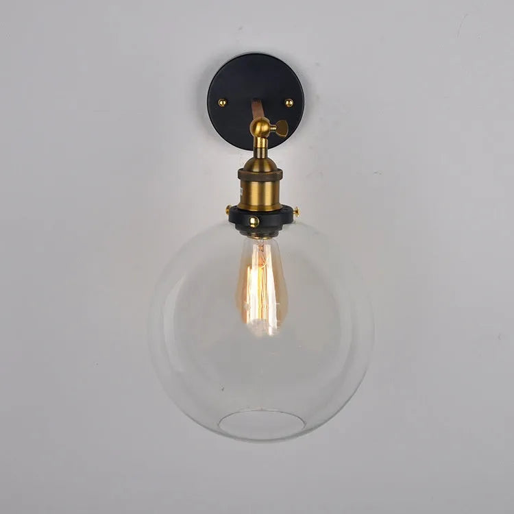 Round retro glass ball wall lamp in amber colour, 20cm diameter, with aluminium holder.