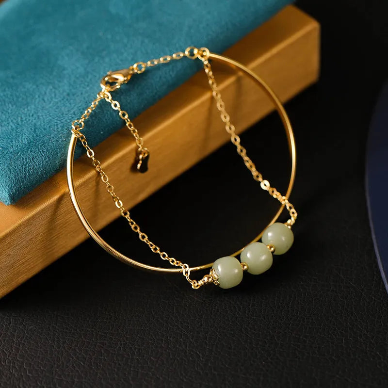 Women's jade lucky beads bracelet with gold inlay treatment showing single, double, and three beads versions