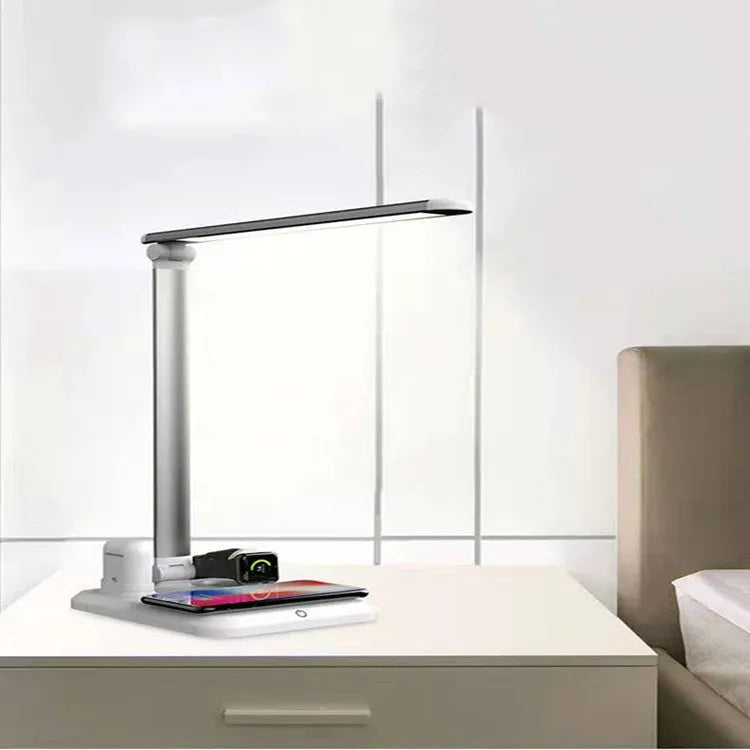 Black and white 4-in-1 LED desk lamp with wireless charging pad and Type-C interface