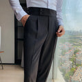 Men's straight-leg casual trousers in solid colours showing waist sizes 29-36 and polyester fabric.