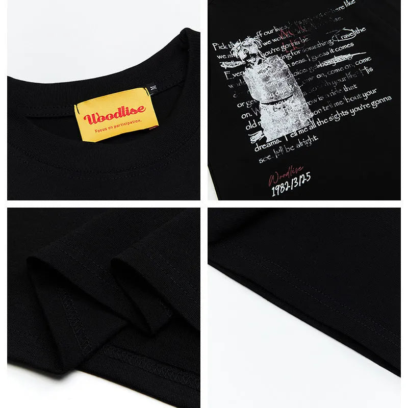 Men's black retro loose fit cotton t-shirt with white printed letters and raglan sleeves.