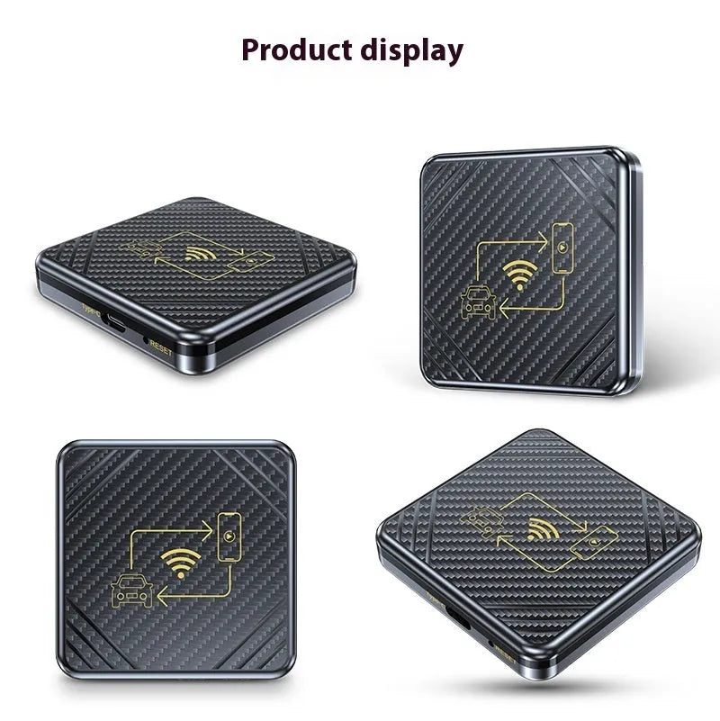 Gold and white wireless CarPlay and Android Auto USB adapter box for cars on a dark surface.