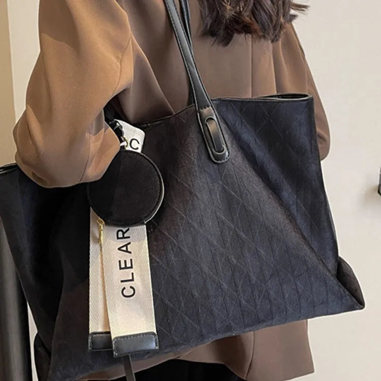 Casual large capacity shoulder bag in horizontal square shape with zippered interior compartment