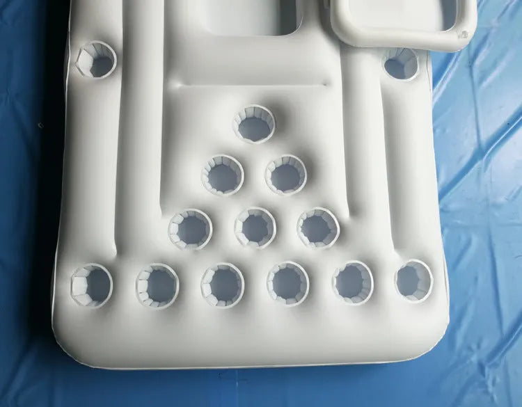 Inflatable beer pong buoy floating on pool water with cups set up on 24-hole blue surface