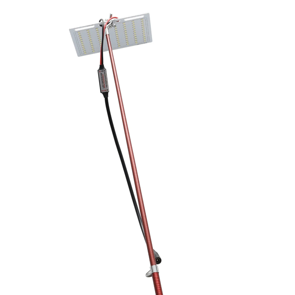 White LED fishing rod light unit on a tall telescopic pole with a remote control for outdoor use.