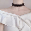 Velvet ruffled clavicle necklace with floral alloy pendant on snake bone chain in black, light coffee, or white.