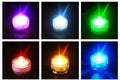 LED waterproof electronic candle light in seven colours, 3cm diameter, 2.6cm height, plastic body, 12-pack
