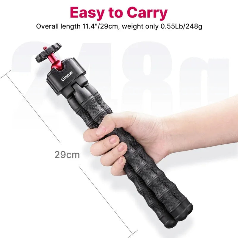 Multifunctional photography video vlog suite featuring an adjustable aluminium tripod on a flat surface.