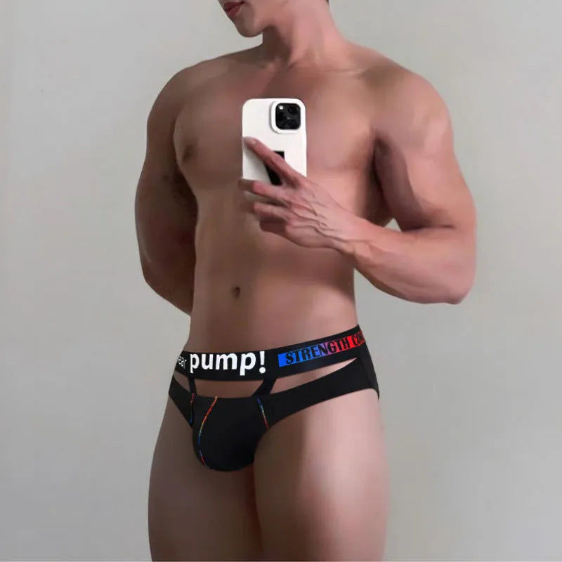 Men's solid black modal briefs with low waist design laid flat