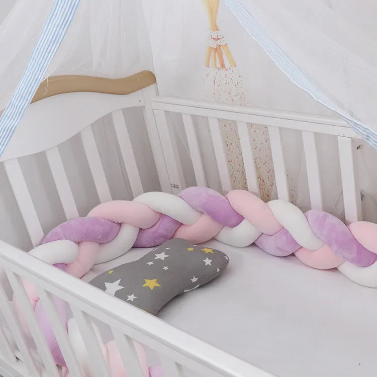 Spandex crystal velvet baby cot bumper in grey pink colour, shown flexible and long.