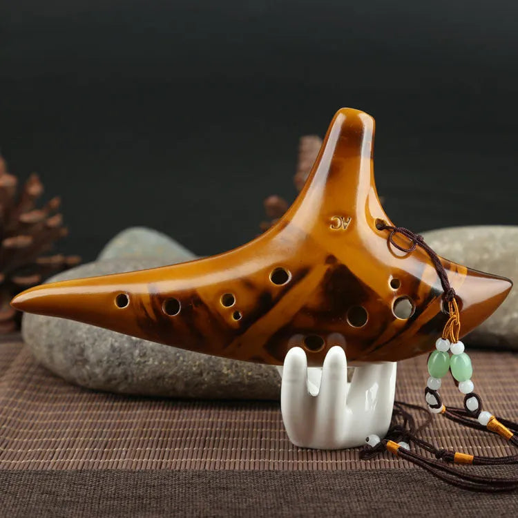 Yellow 12-hole ceramic ocarina in Alto C with 13-note C major range, integrated lanyard, bag and cable