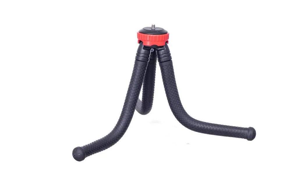 Black octopus tripod with flexible rubber legs wrapped around a pole holding a camera