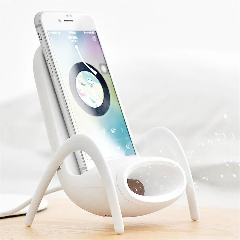 White mini chair-shaped wireless phone charger with 10W fast charging capability on desk