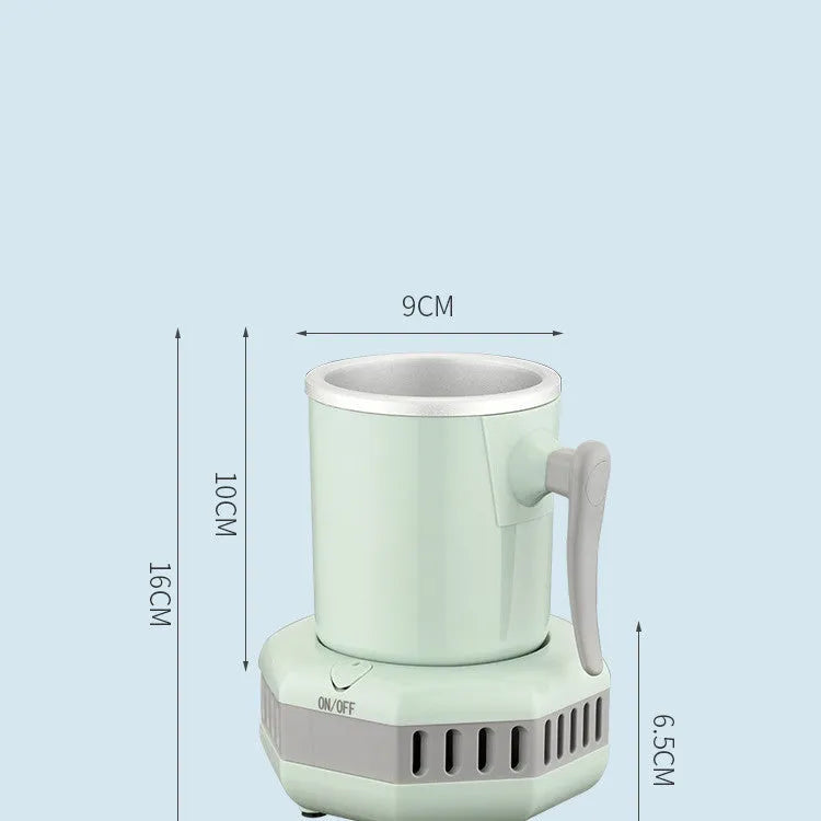 White mini quick cooling cup with aluminium drinking vessel and electronic base on a desk.