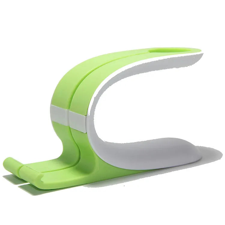 Grey charging stand holding Apple mobile phone and watch for simultaneous desktop charging