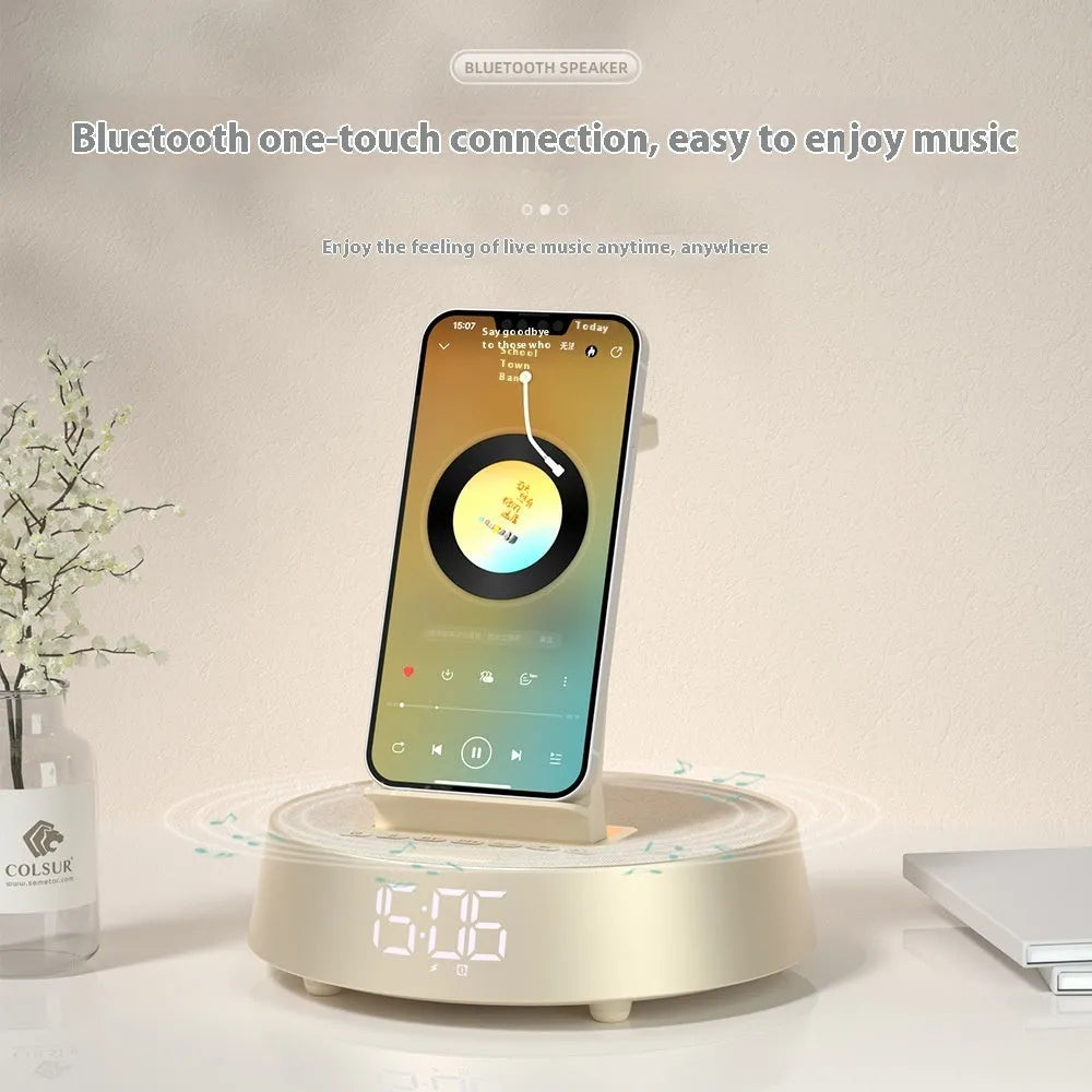 Wireless Bluetooth speaker alarm clock with phone holder in creamy-white colour on a wooden bedside table