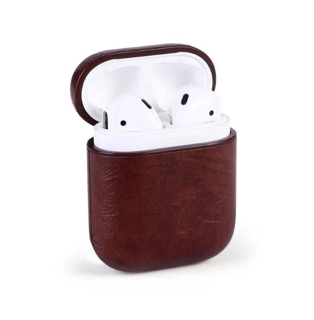 Genuine leather protective case for Apple Airpods charging box in black, brown, light brown, and red.