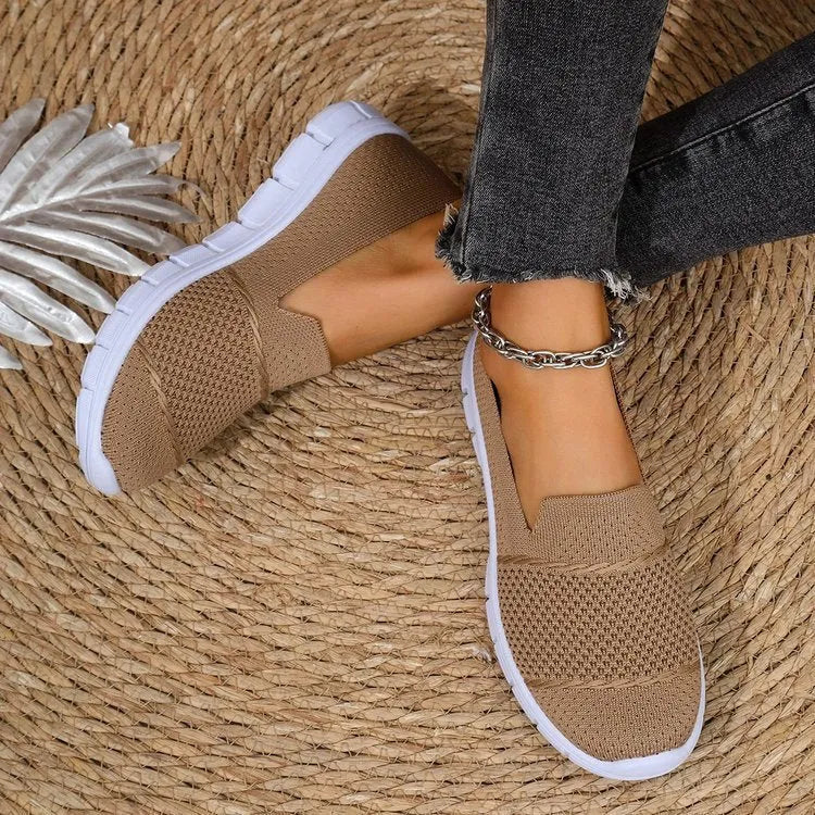 Women's mesh breathable flat casual shoes in black, round toe, PVC sole, side view