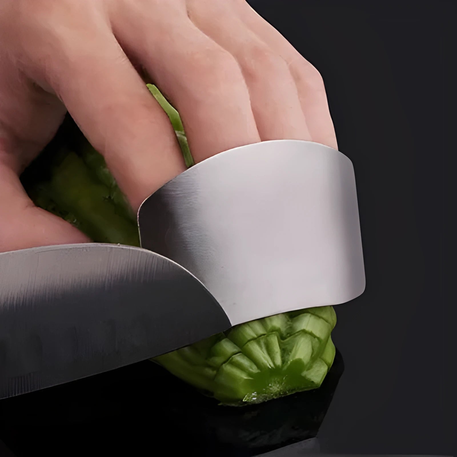 Stainless steel finger guard for kitchen safety shown in single and double finger sizes.