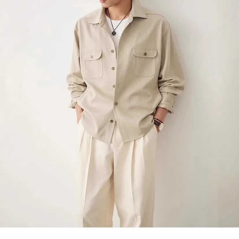 Men's casual shirt with a cotton lapel in light sand rice colour, showing long sleeves and simple design.