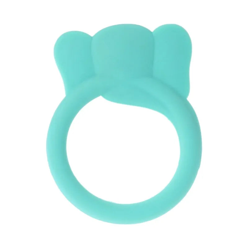 Three silicone baby molar teethers in brown, blue, and yellow on a light background