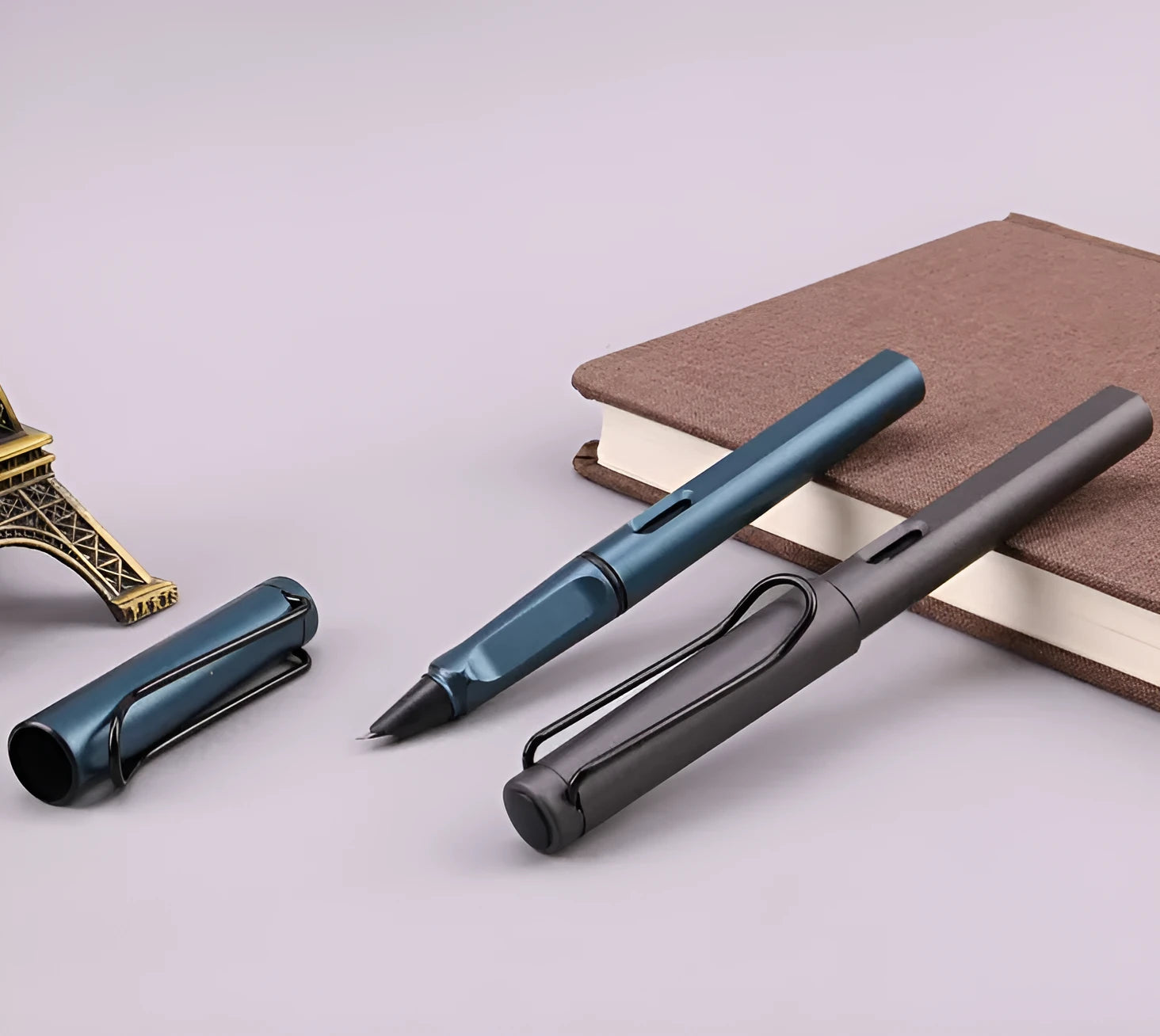 Black and blue frosted plastic fountain pen with 0.5mm and 0.38mm nib options shown.