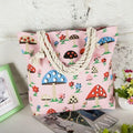 Large capacity casual canvas tote bag with printed design, zipper closure, and soft handles for women