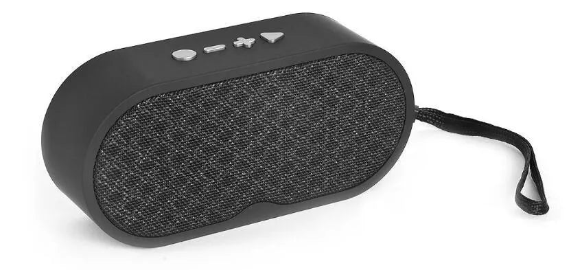 A grey Bluetooth wireless subwoofer speaker unit with a front-facing grille, sitting on a surface.