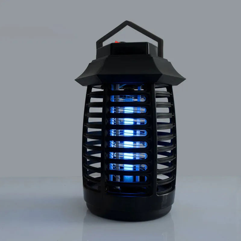 Black aromatherapy mosquito killer lamp with choice of UV or LED tube on a table