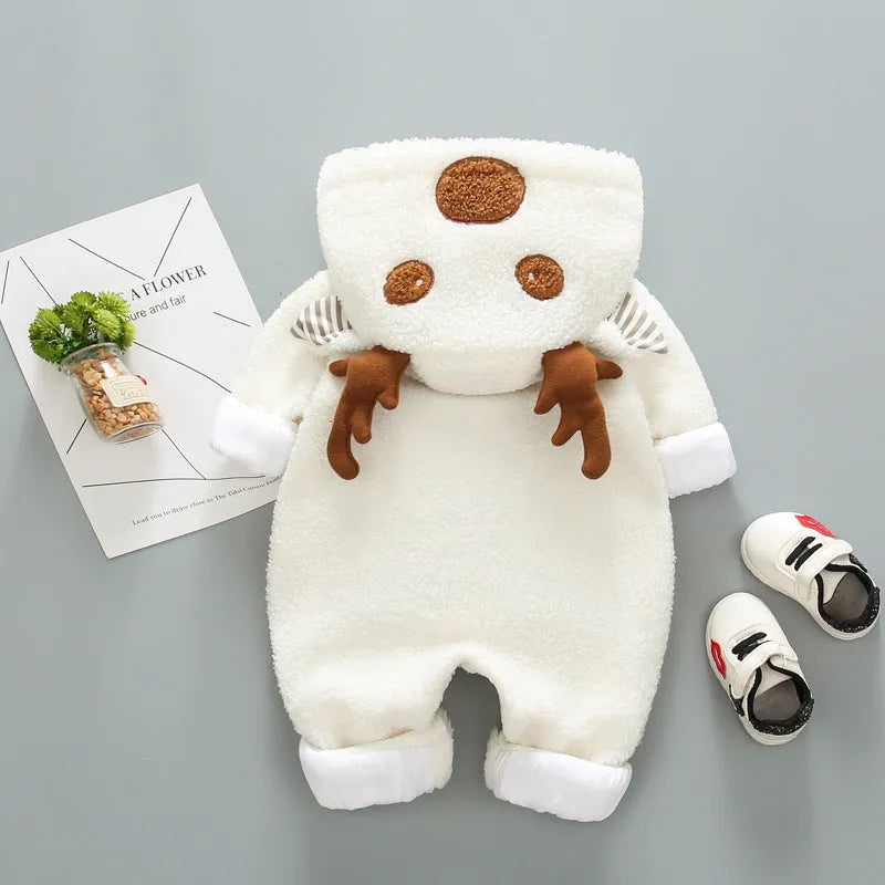 Long-sleeved baby romper with front lace-up strap closure in a khaki colour.