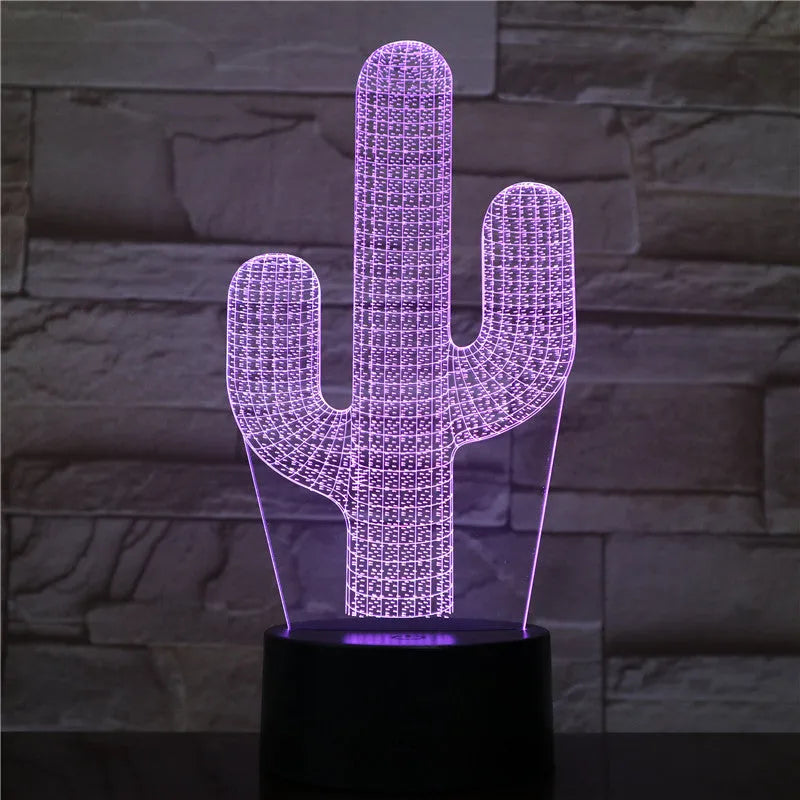 Cactus LED night light with 3D illusion board showing green glow on a table