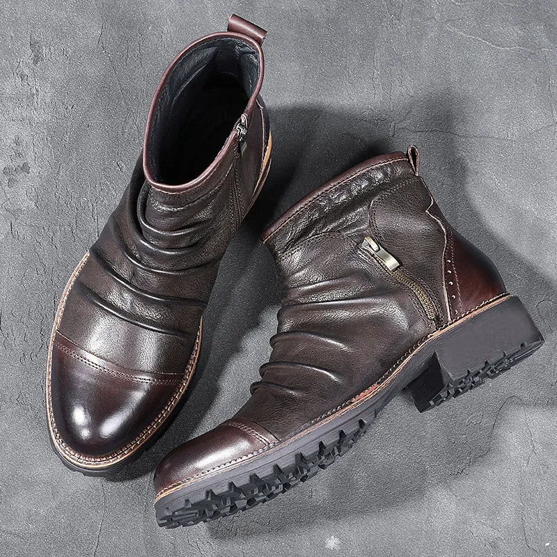 Black mid-calf cowboy boots with side zip and embossed leather texture