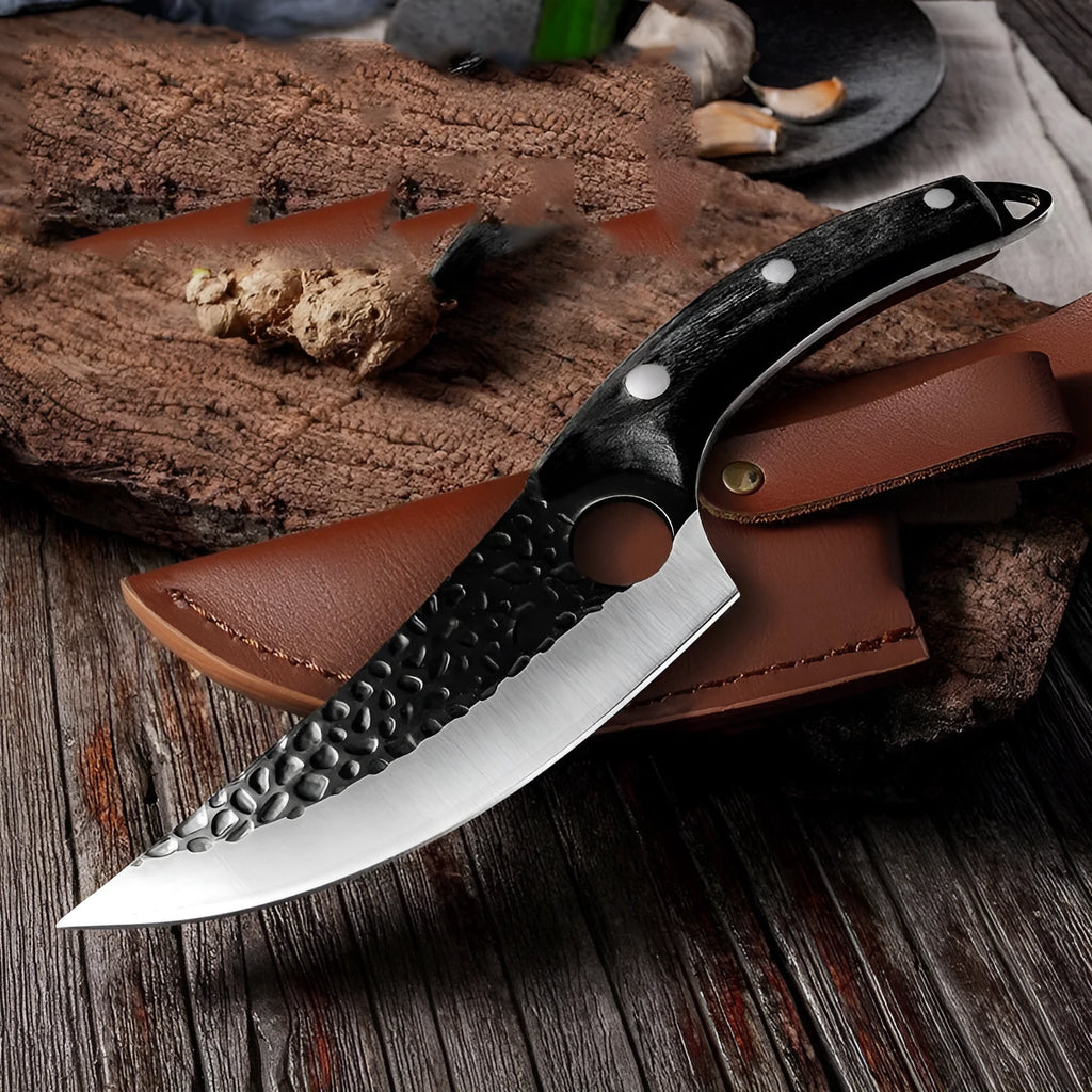Slaughter and boning knife with curved blade, hammer pattern finish, ring handle, and brown leather sheath.