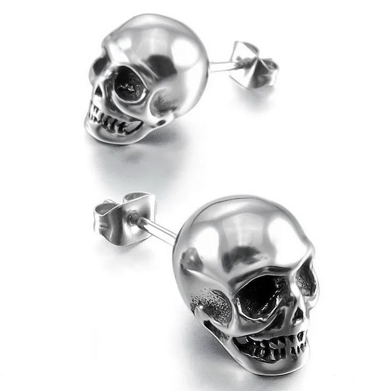 Pair of small punk skull stud earrings in black or silver white copper with push-back fittings