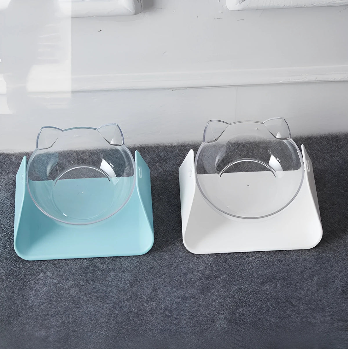 Protective cervical cat bowl in plastic with beveled sloped design, available in blue pink black white and yellow